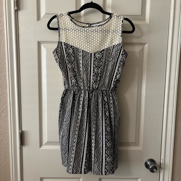 Eyelet Sleeveless Mini Dress with Pockets - Picture 1 of 5